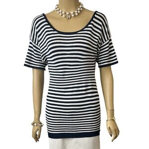 Ellen Tracy Ladys Blouse With A Low Back And A Scoop Front Neckline.